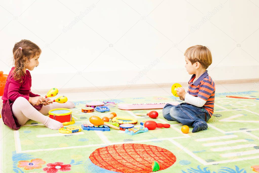 Kids playing with toys