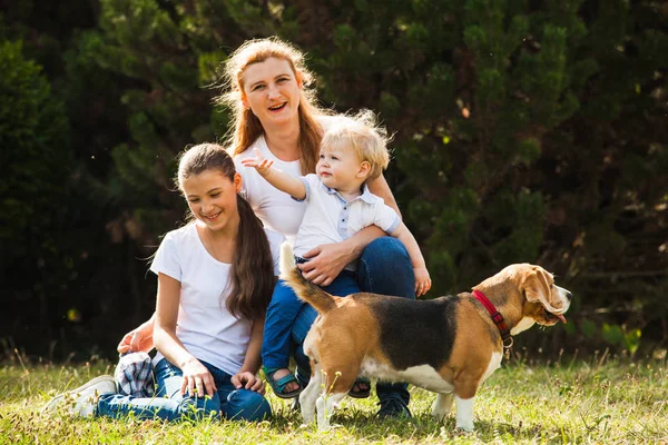 Mom with kids on a walk — Stock Photo, Image