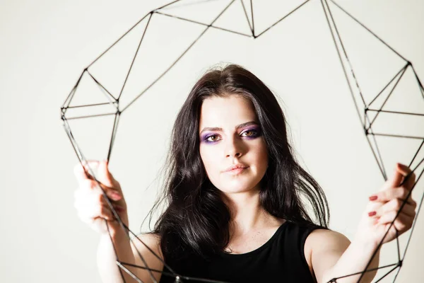 Female holding model of geometric solid — Stock Photo, Image