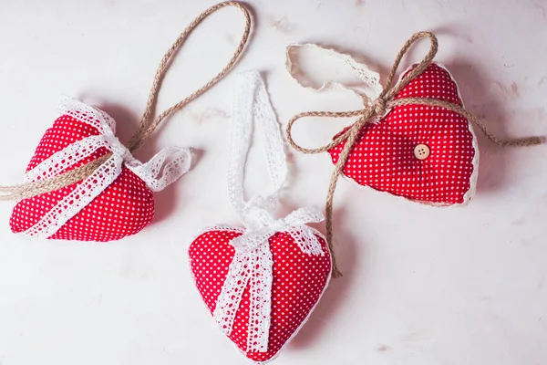 Red polka dot textile hearts — Stock Photo, Image