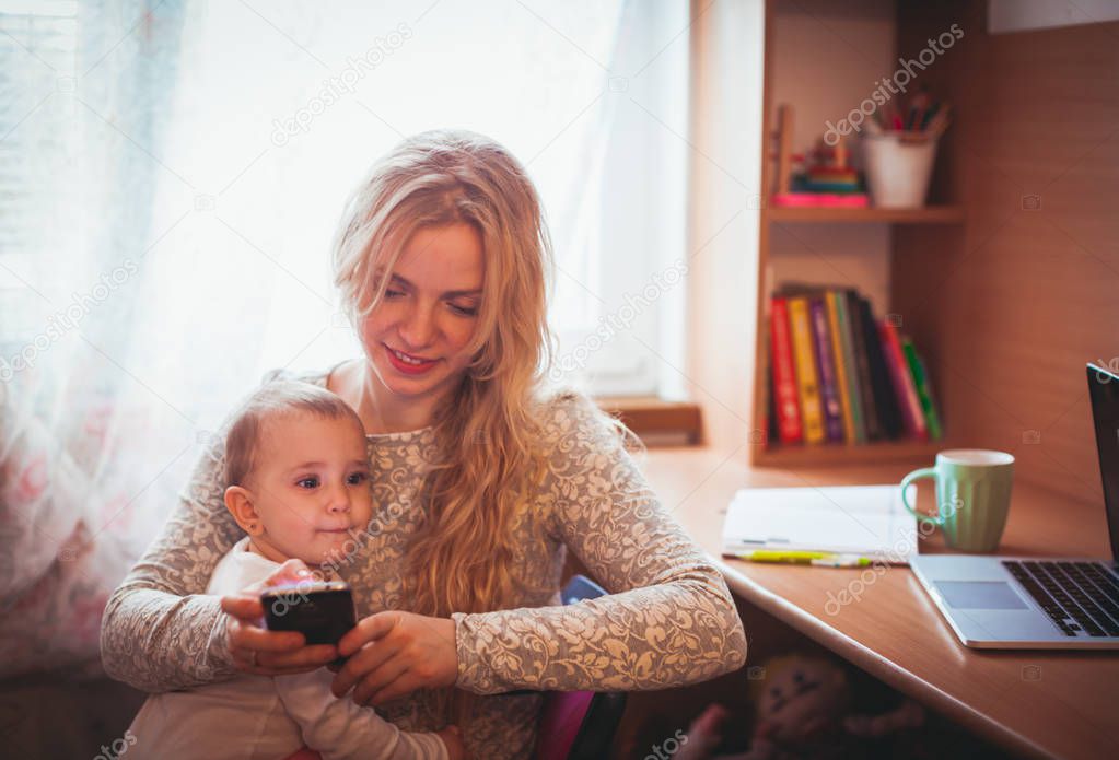 Freelance worked mom with baby