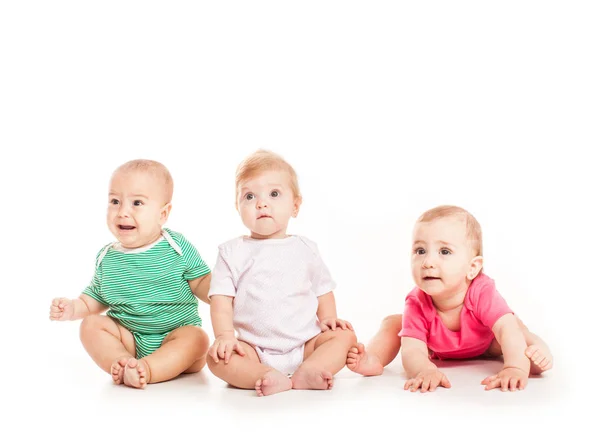 Tres bebés sentados — Foto de Stock