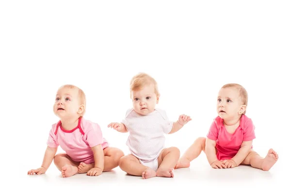 Three babies sitting — Stock Photo, Image