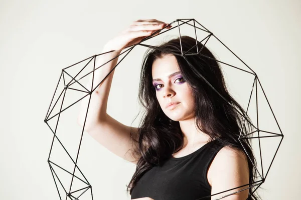 Female holding model of geometric solid — Stock Photo, Image