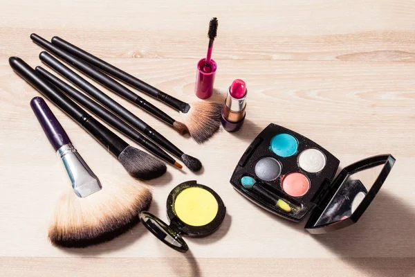 Cosmetics on a wooden background — Stock Photo, Image
