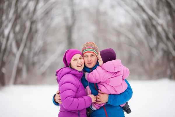 Family in the winter forest — Stock Photo, Image
