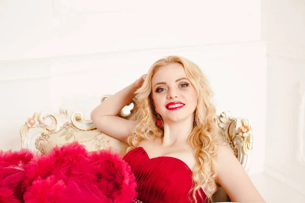 Woman in red cloudy dress — Stock Photo, Image