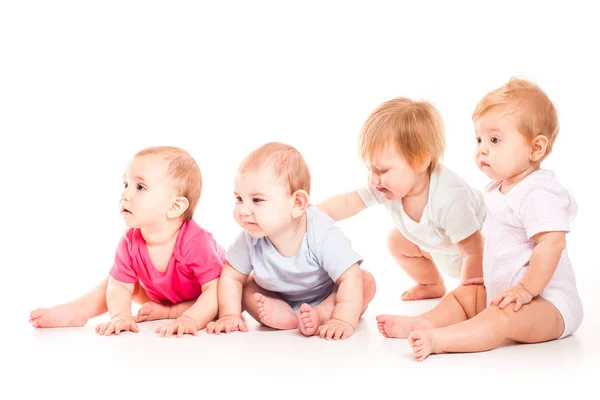 Concepto de infancia. Lindos bebés sobre fondo blanco — Foto de Stock