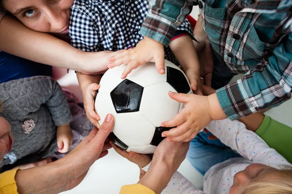 Children stretch to the ball — Stock Photo, Image