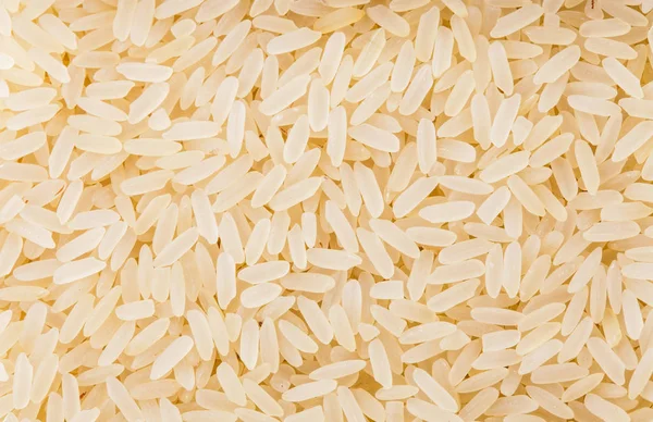 Parboiled rice background — Stock Photo, Image