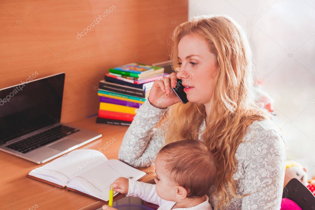 Freelance worked mom with baby