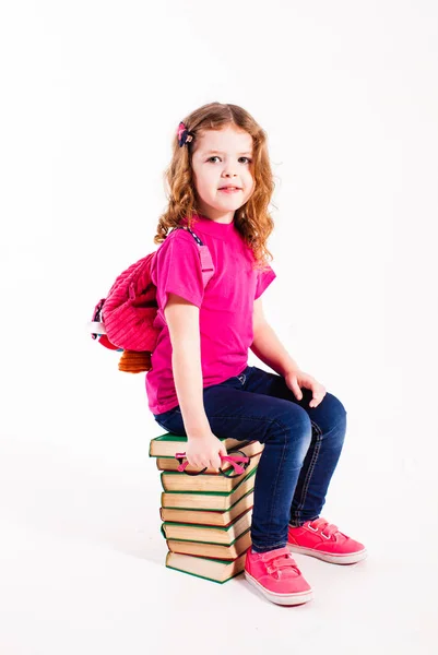 Little girl with books — Stock Photo, Image