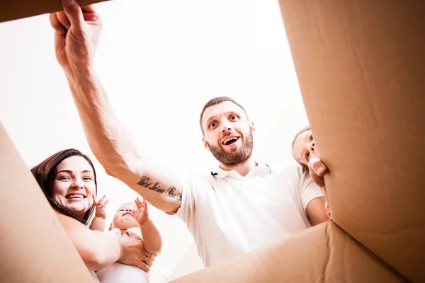 Surprise for a happy family — Stock Photo, Image