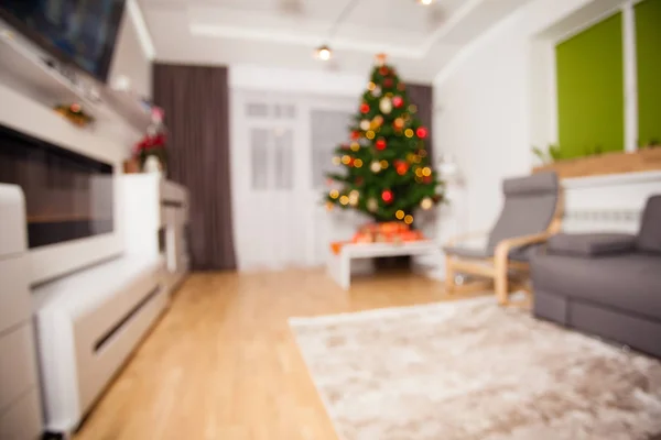 Christmas home room with tree and festive bokeh lighting, blurred holiday background — Stock Photo, Image