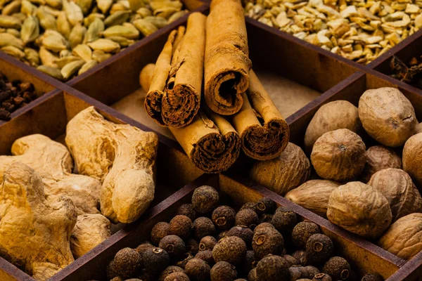 Different spices and herbs in a box — Stock Photo, Image