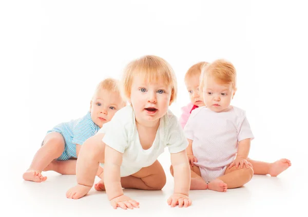 Group of funny babies sitting on white background, isolated — Stock Photo, Image