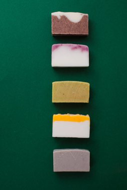 Different handmade soap bars, flat lay, top view. Eco soap and cosmetics. Natural healthy product.