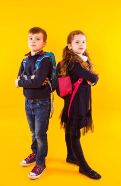 Happy kids, boy and girl, ready back to school