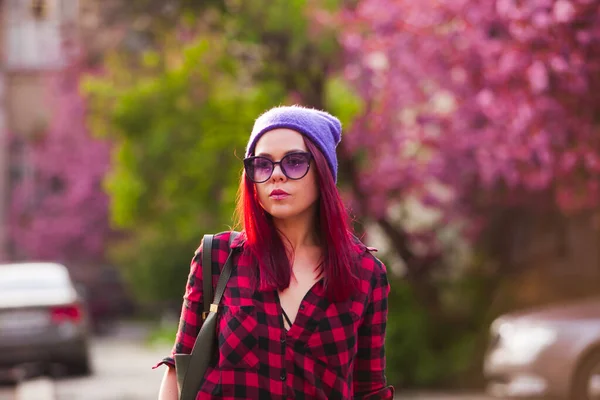 Model with bright colored hair walking in the city Stock Picture