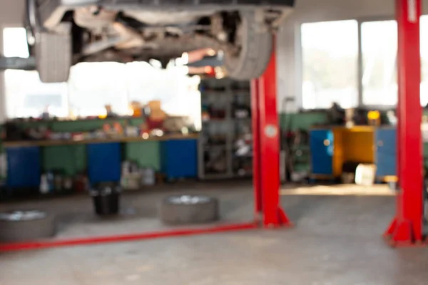 Estación de servicio de reparación de automóviles fondo borroso para el diseño — Foto de Stock