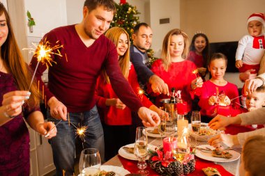 Men and women on New Years eve with sparkles