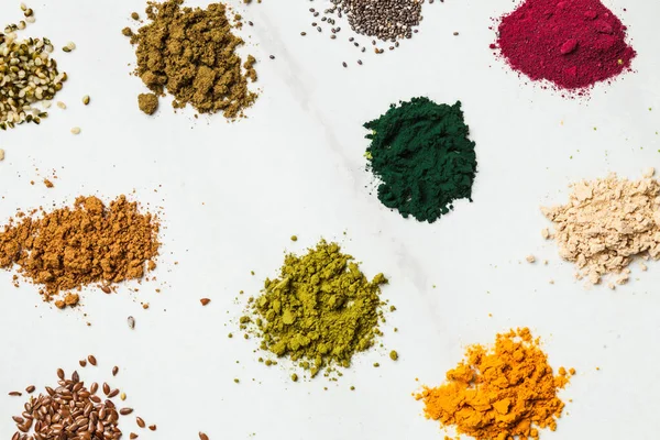 Top view various dietary supplements scattered on the table — Stock Photo, Image