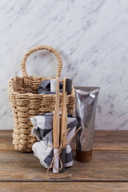 Bamboo toothbrushes and paste on light table
