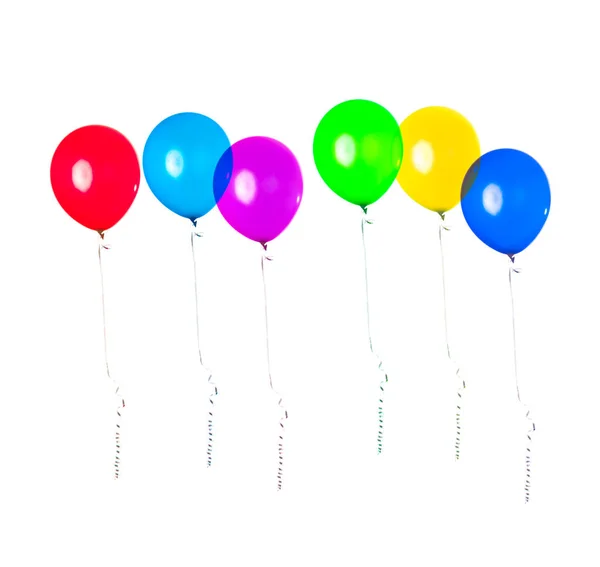 Fila de balões de festa pendurados no ar sobre fundo branco. Decoração de aniversário . — Fotografia de Stock