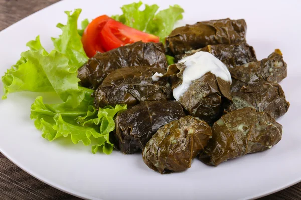 Dolma - stuffed meat in grape leaves — Stock Photo, Image