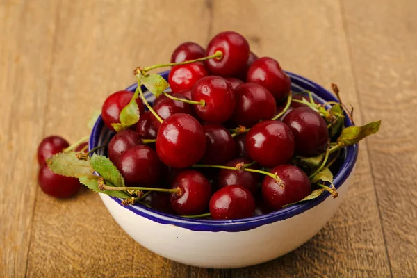 Cherry berries in the bowl Stock Picture