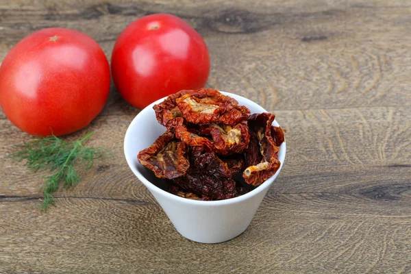 Dry tomatoes in the bowl — Stock Photo, Image