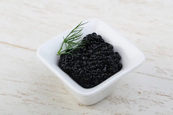 Caviar negro en el tazón —  Fotos de Stock