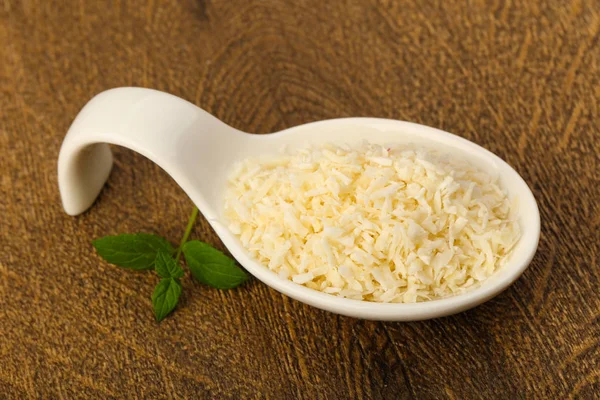 Coconut flakes in the bowl — Stock Photo, Image