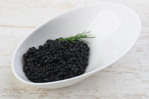 Black caviar in the bowl — Stock Photo, Image