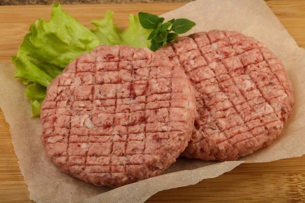 Raw burger cutlets