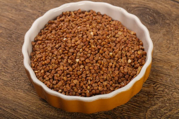 Raw buckwheat  in the bowl — Stock Photo, Image