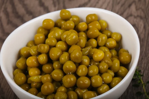 Pickled peas  in the plate — Stock Photo, Image