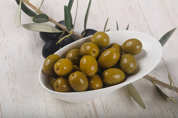 Green olives in the bowl