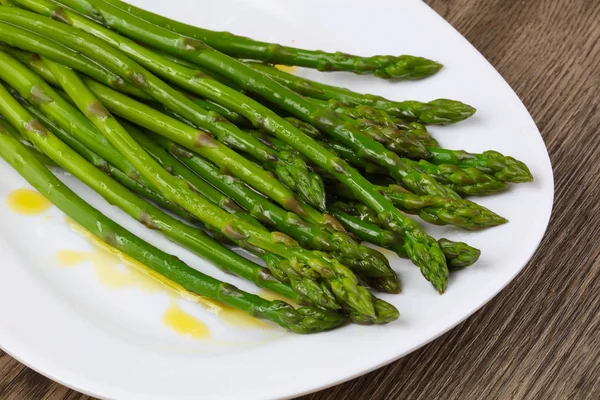 Boiled asparagus with olive oil Stock Picture