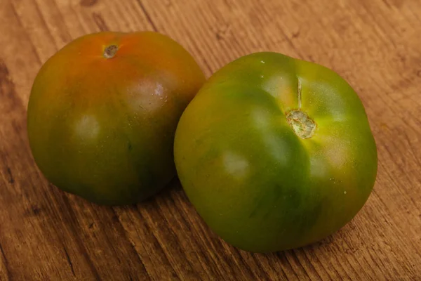 Кумато, чёрные помидоры — стоковое фото