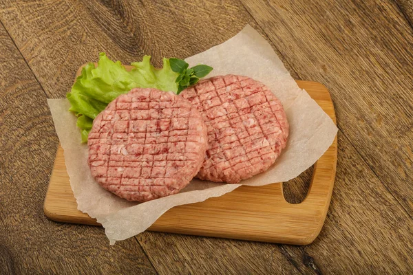 Raw burger cutlets