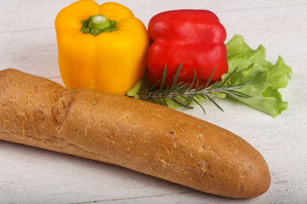 Crust baguette with vegetables — Stock Photo, Image