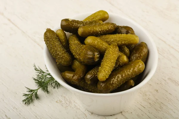 Pickled cucumbers in the bowl — Stock Image Pickled cucumbers in the bowl Royalty Free Stock Photos