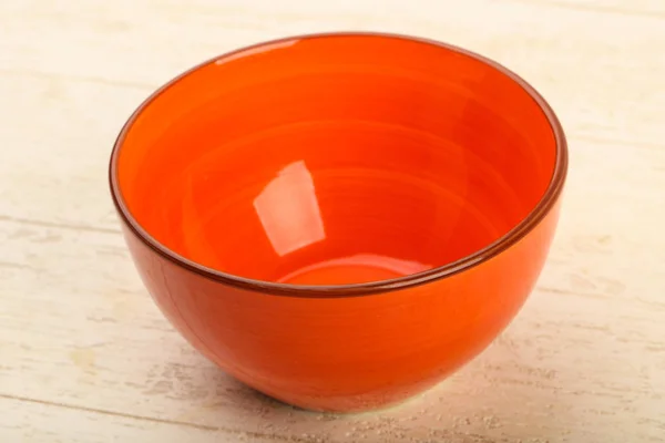 Empty orange bowl — Stock Photo, Image