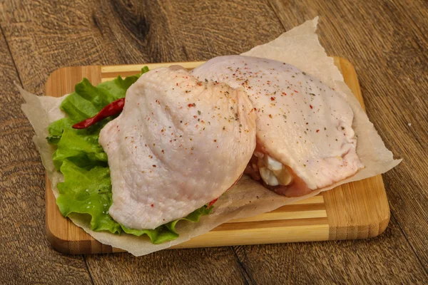 Raw chicken thigh