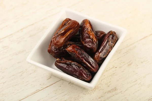 Sweet dates in the bowl — Stock Photo, Image