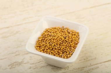 kabın içinde hardal tohumu