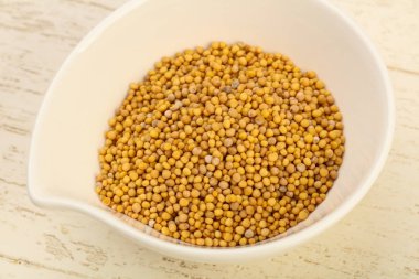 kabın içinde hardal tohumu