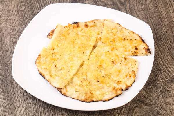 Naan with cheese and garlic — Stock Photo, Image