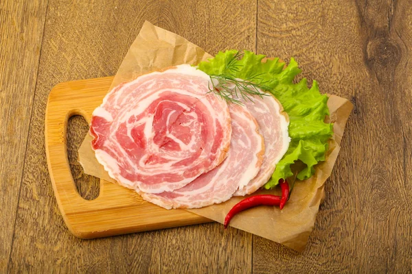 Нарезанный свиной бекон Панчетты — стоковое фото